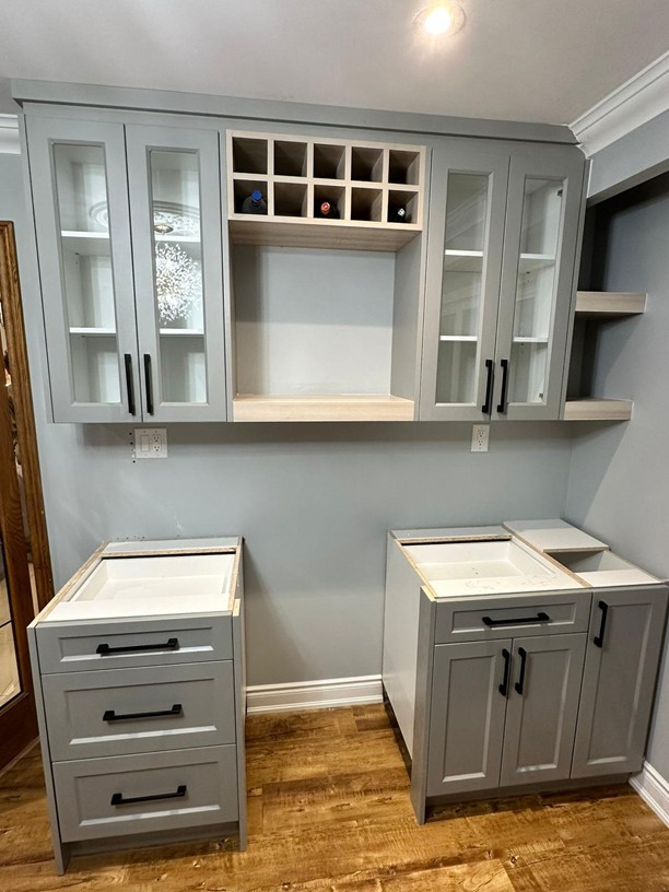 Luxury Kitchen Design - Dark cabinets with gold hardware